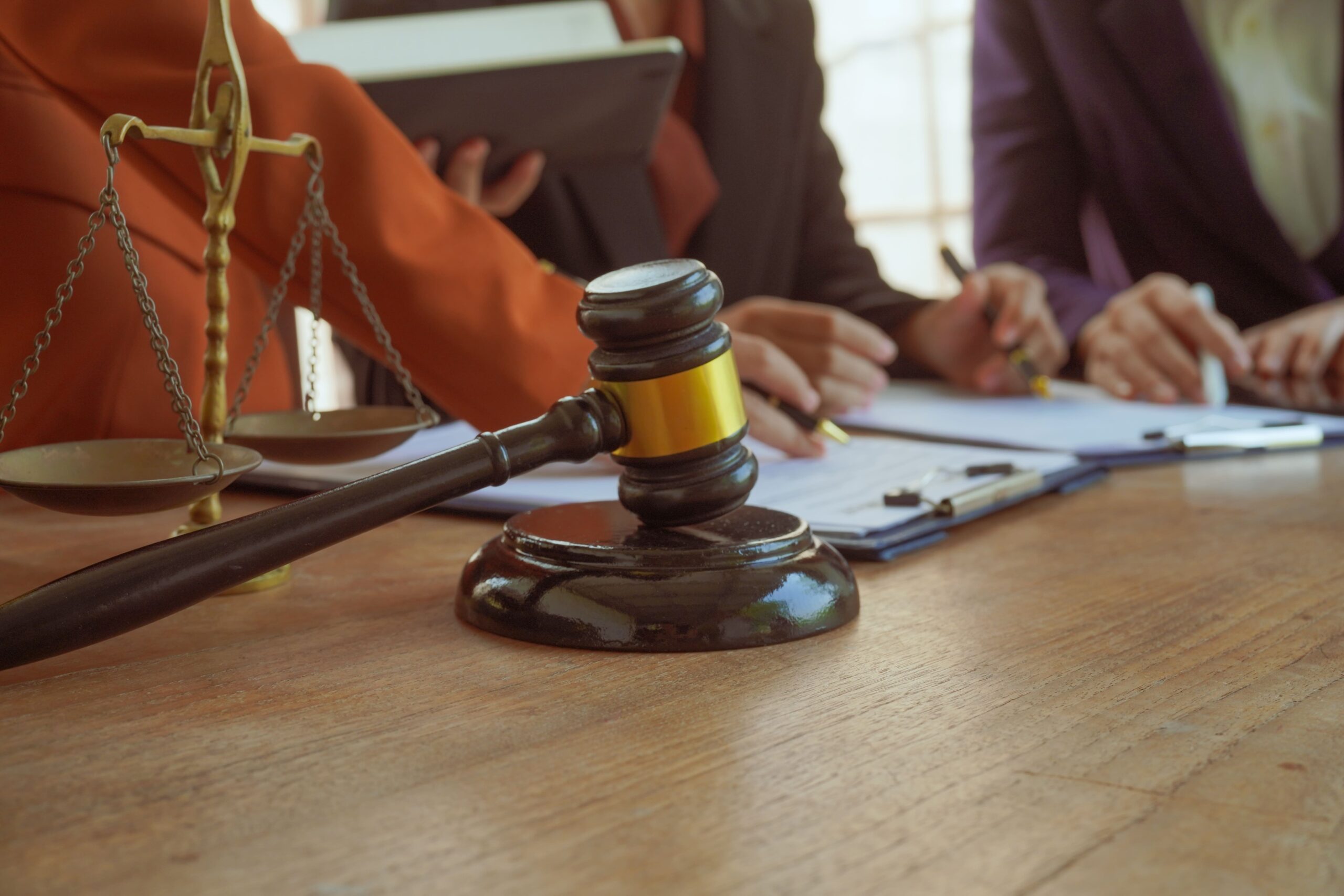 a-group-of-lawyers-and-clients-engage-in-a-profess-2026-01-08-01-25-49-utc (1)